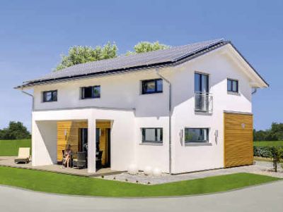 Einfamilienhaus mit weißer Edelputzfassade und Holzelementen  Foto  BDF  Haas Fertigbau